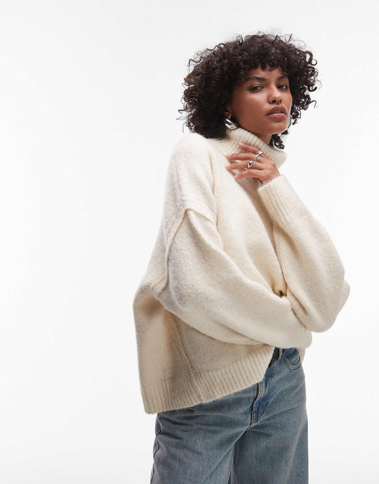 Knitted Exposed Seam Roll Neck Relaxed Jumper