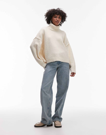 Knitted Exposed Seam Roll Neck Relaxed Jumper