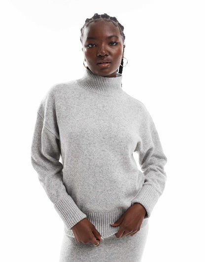 Knitted High Neck Jumper With Turn Back Cuffs