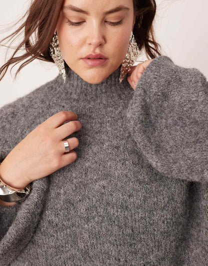 Curve Knitted Oversized High Neck Jumper