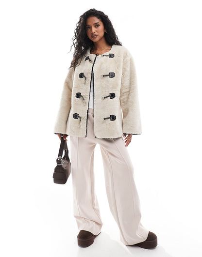 Faux Fur Jacket With Buckle Fastening