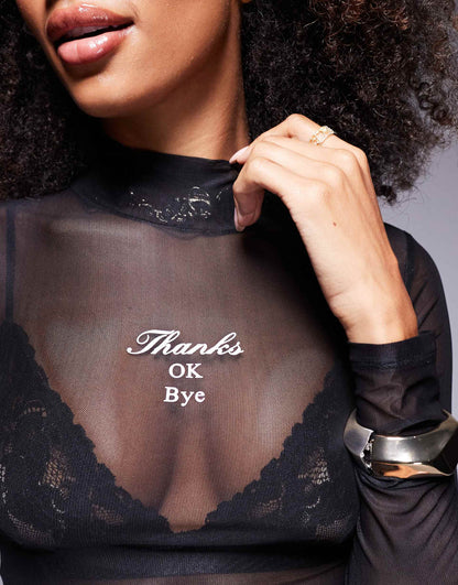 Dasori Chest Slogan High Neck Mesh Long Sleeve Top