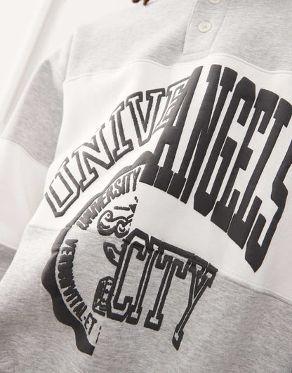 Andre Oversized Polo Sweatshirt With Cut And Sew Varsity Graphic