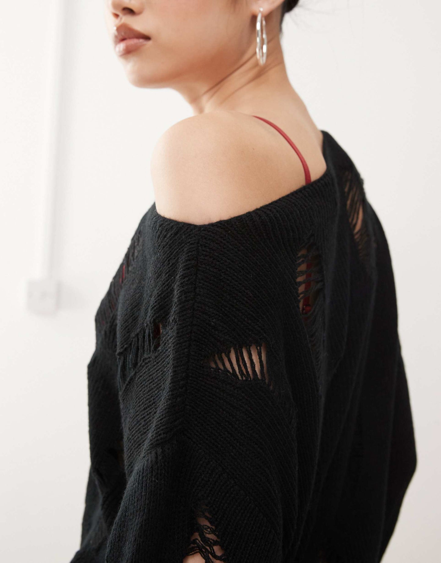 Distressed Ladder Stitch Slash Neck Jumper