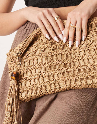 Straw Clutch Bag With Open Weave And Tassel And Bead Detail