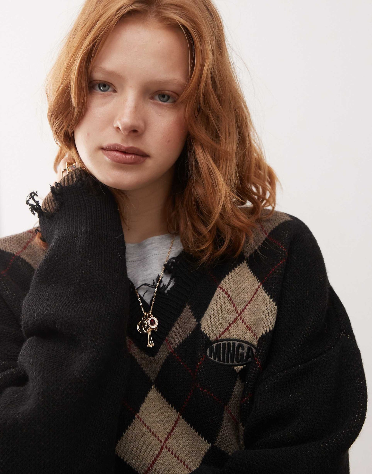 London Argyle V-Neck Jumper With Distressed Edges