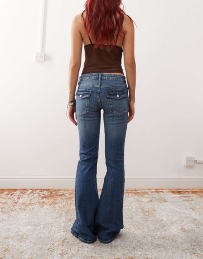Cheri Low Waist Wide Flare Jeans With Pockets