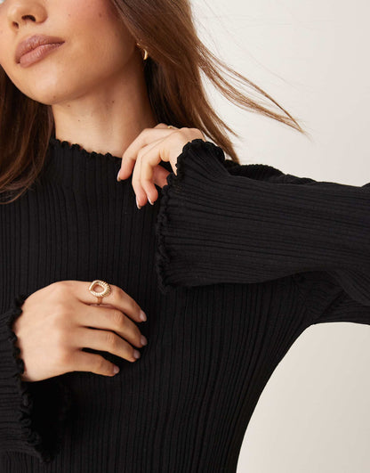 Long Sleeve Ribbed Knit Top With Fluted Funnel Neck And Cuffs