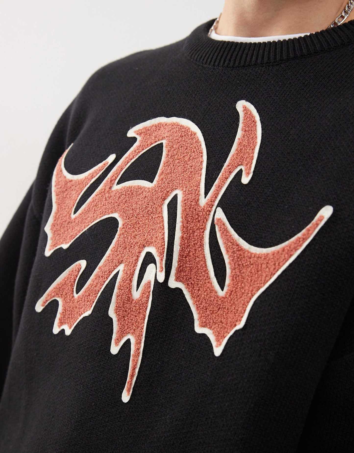 Cypher Oversized Jumper With Red Jacquard Graphic