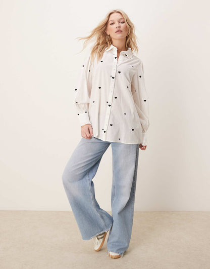 Oversized Shirt With Heart Embroidery And Ruffle Trim Detail