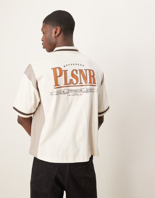 Boxy Oversized Zipped Polo With Cut And Sew Panelling And Text Graphic