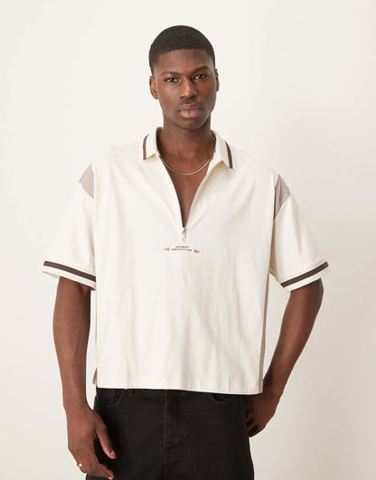 Boxy Oversized Zipped Polo With Cut And Sew Panelling And Text Graphic