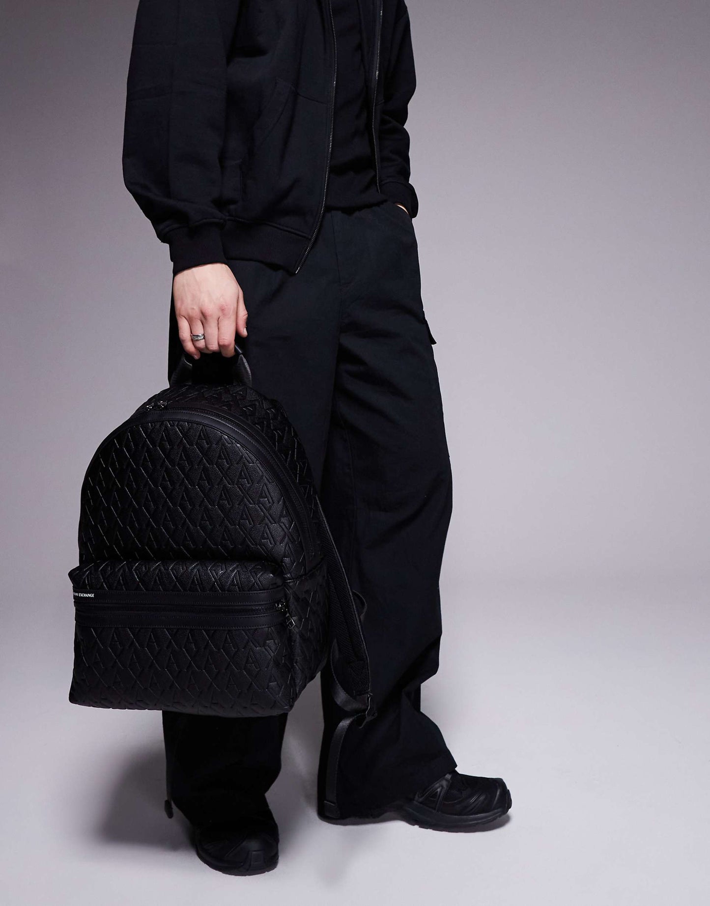 All Over Logo Faux Leather Backpack