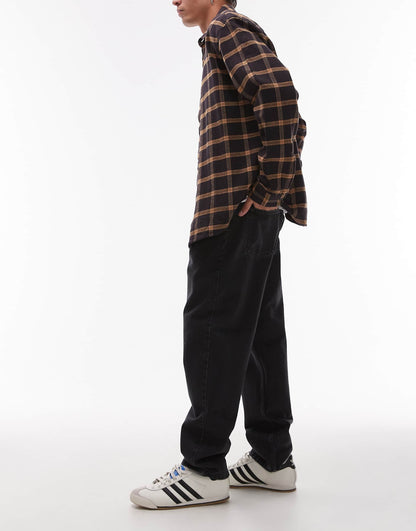 Newel Relaxed Tapered Fit Jeans
