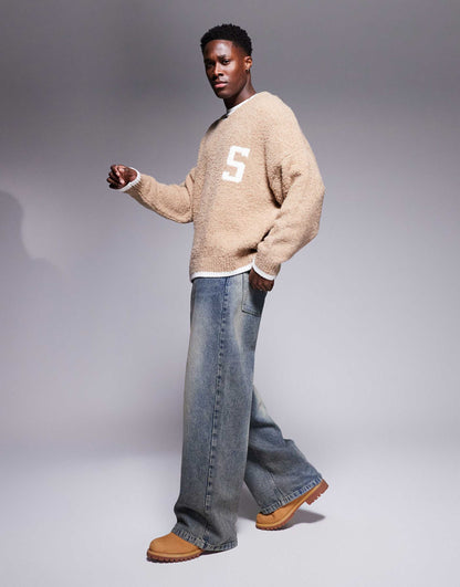 Oversized Boxy Fit Textured Knitted V Neck Jumper With Chest Pattern And Tipping