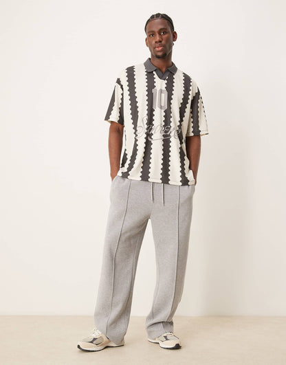 Oversized Polo With Sports Graphic And All Over Print