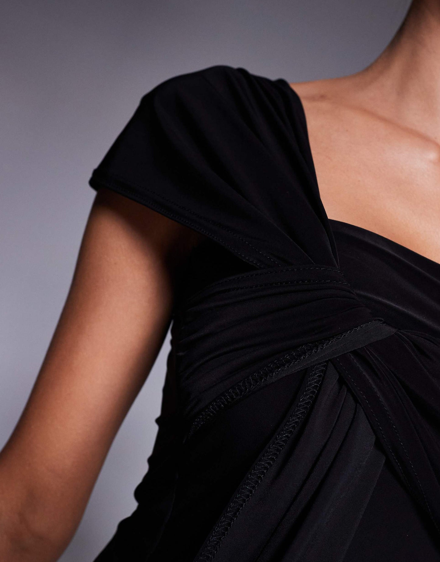 Double Sculpted Slinky Asymmetric Knot Front Detail Top