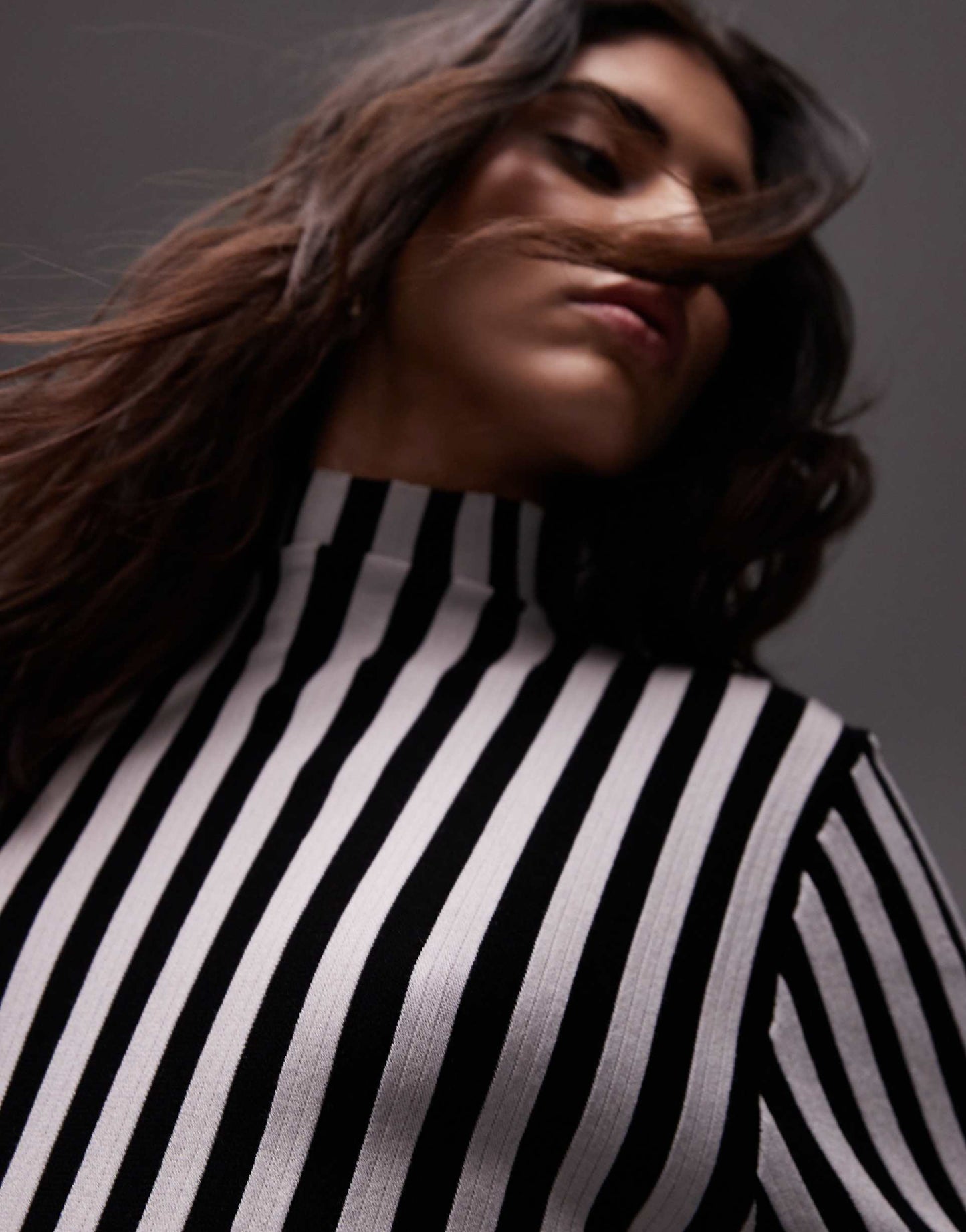 Knitted Plated Vertical Stripe Midi Dress With Asymmetric Hem