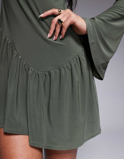 Long Sleeve Mini Dress With Shaped Hem Detail And Flippy Skirt