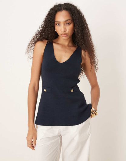 Knitted Structured Peplum Top With Lapels