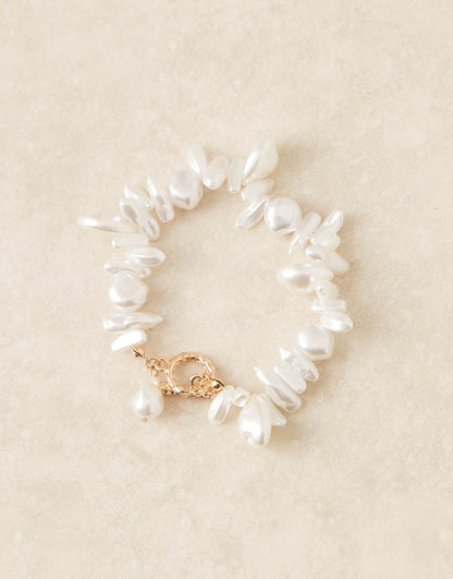 Curve Faux Pearl Bracelet With T-Bar Detail