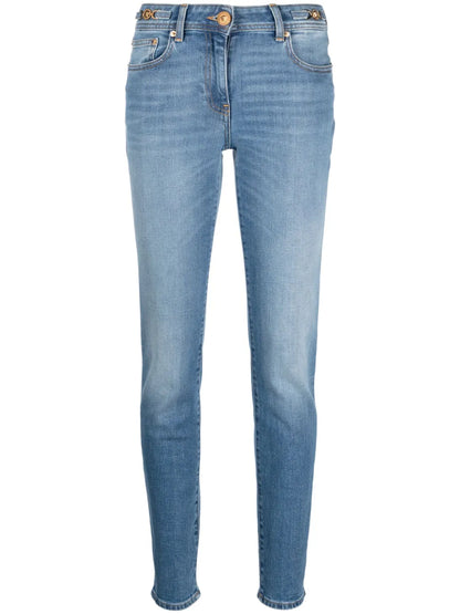 Low-Rise Medusa Head-Motif Skinny Jeans