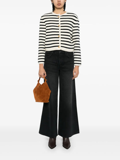 The Slung Sugar Cone Sneak Jeans