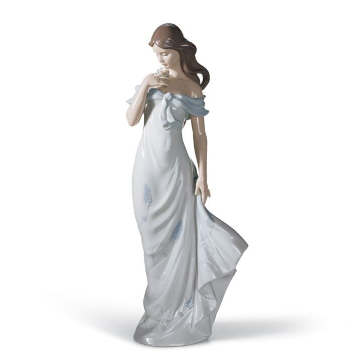 A Flower's Whisper Woman Figurine