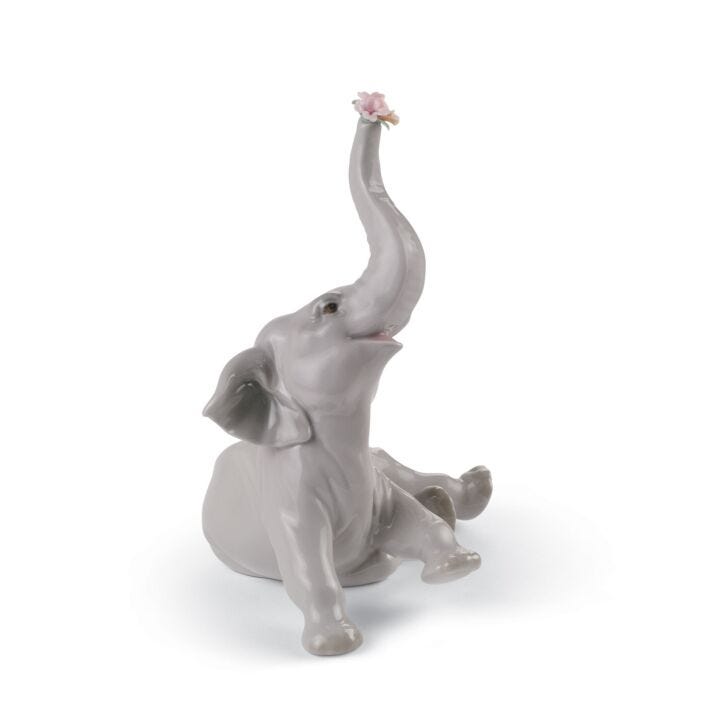 Baby Elephant With Flower Figurine