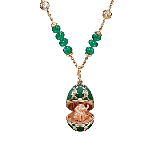 Guilloché Enamel and Emerald Transformable Elephant Surprise Locket